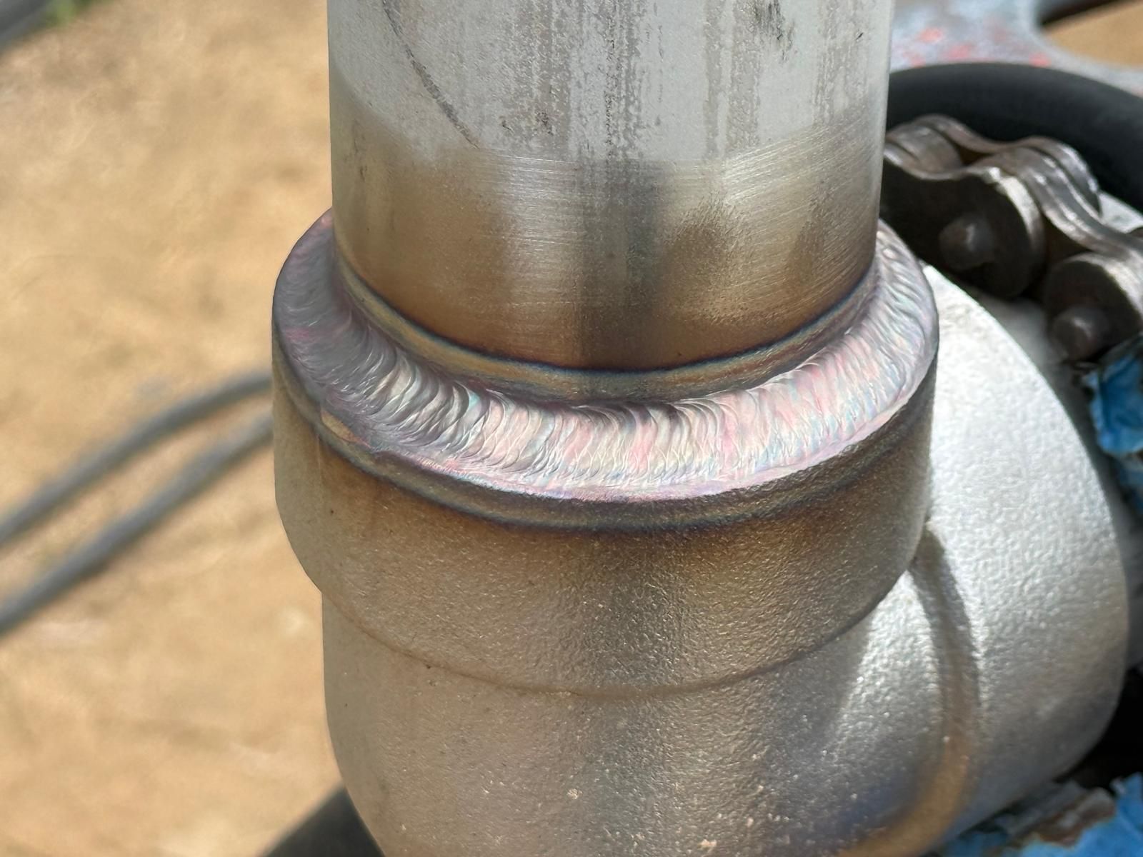 Multi-pass weld on a pipe-to-elbow joint